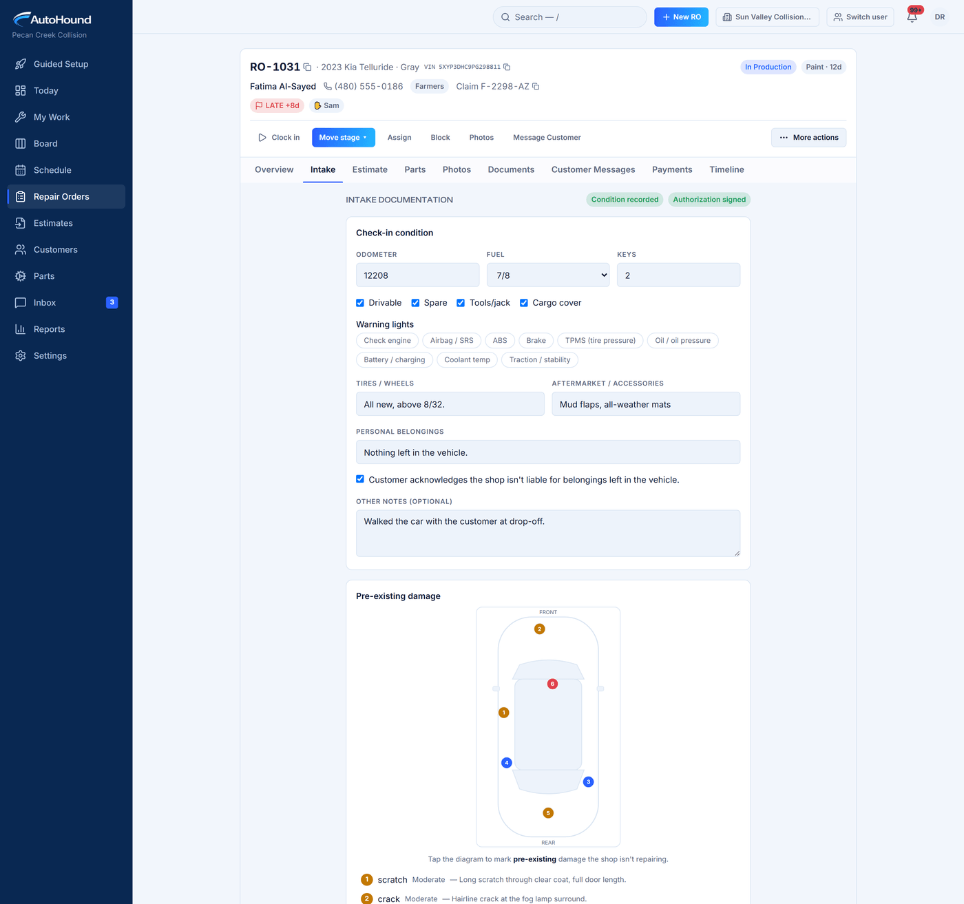 AutoHound check-in with condition details, signed authorization, and numbered pre-existing damage markers